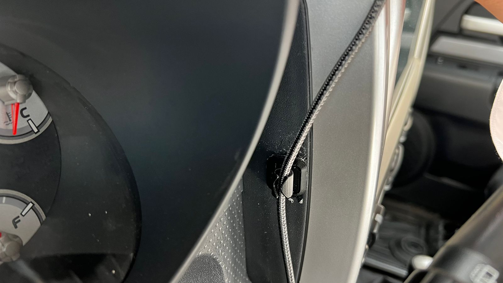 Soporte para cable de carga