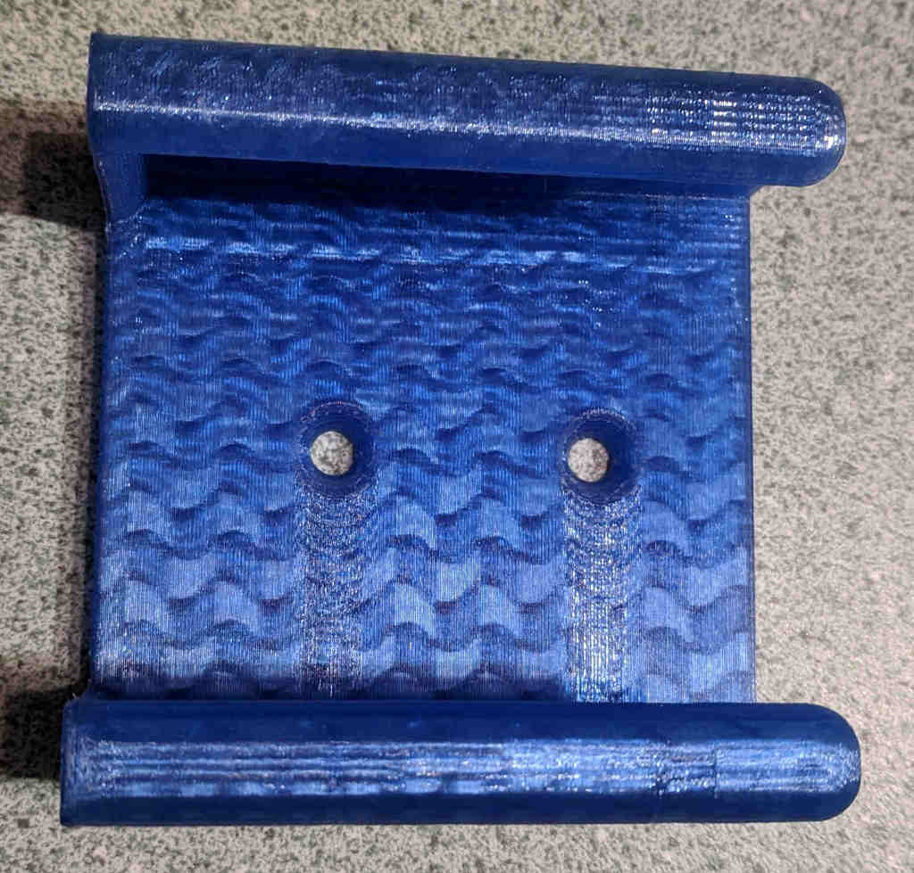 Soporte de montaje en pared para mando a distancia Harmony Xbox 360