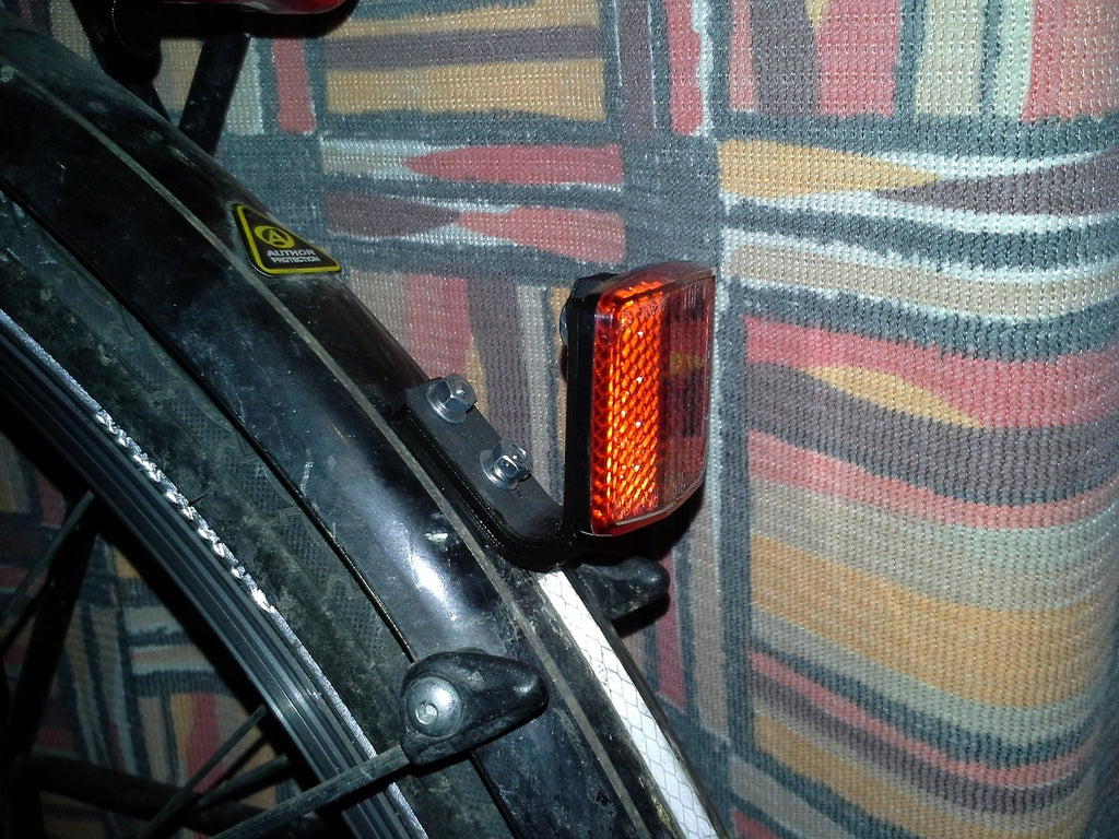 Soporte para reflector de bicicleta y pantalla
