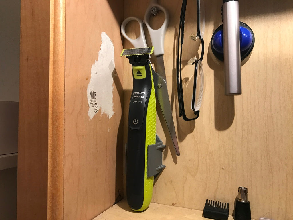 Soporte y montaje de cargador Philips OneBlade