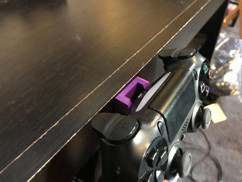 Soporte de pared para controladores de PS4