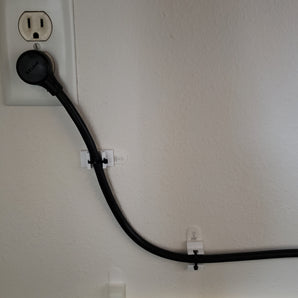 Soporte de cinta adhesiva para atar cables de alimentación
