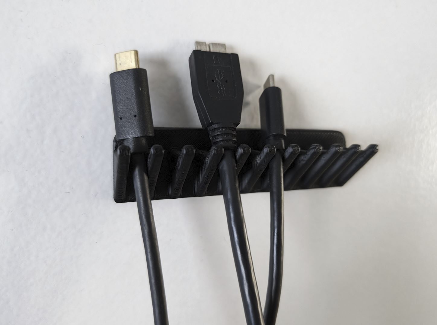 Manejador y organizador de cables