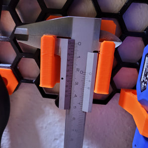 Soporte para calibrador para pared de almacenamiento Honeycomb
