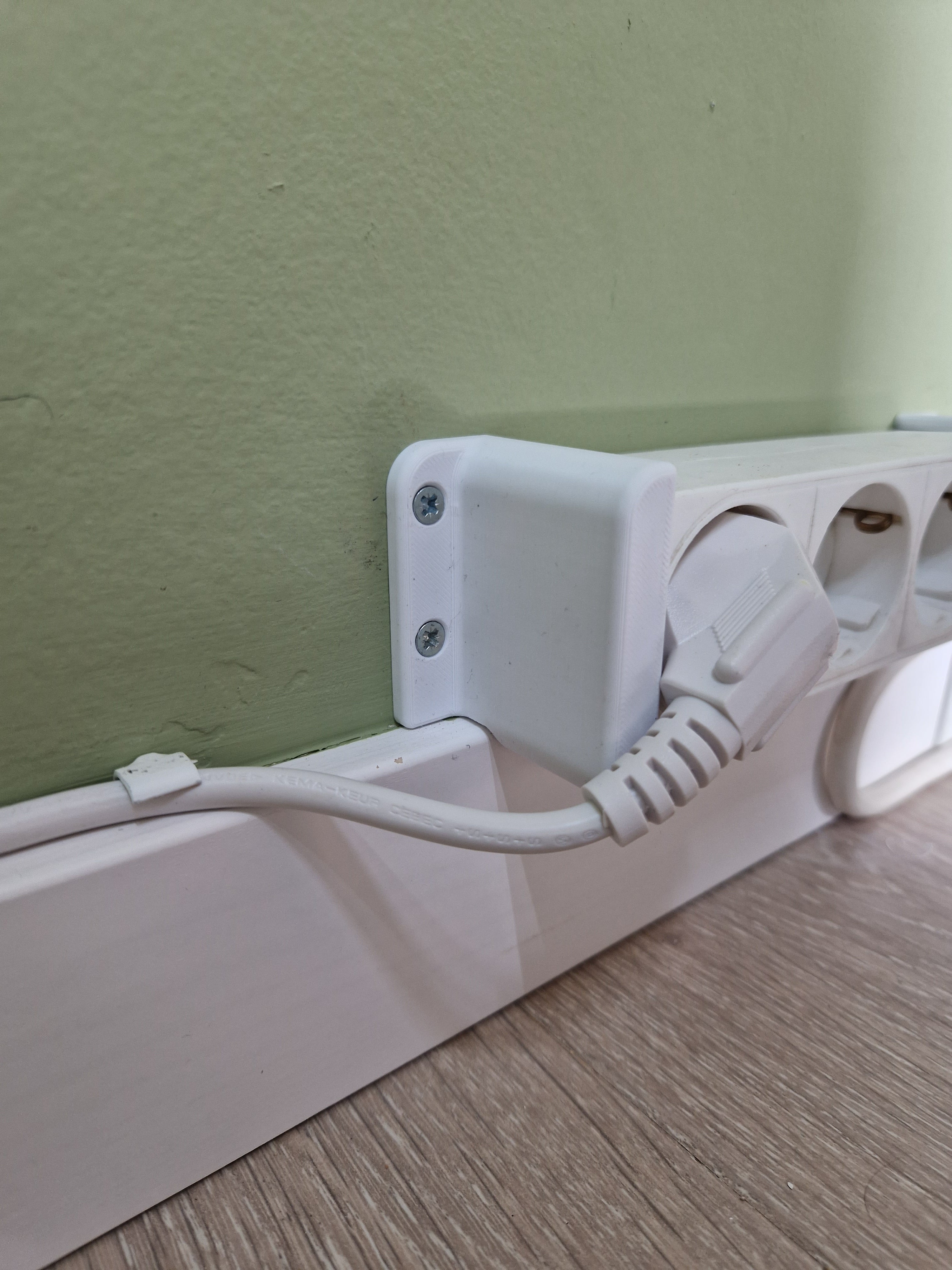 Soporte para cable alargador