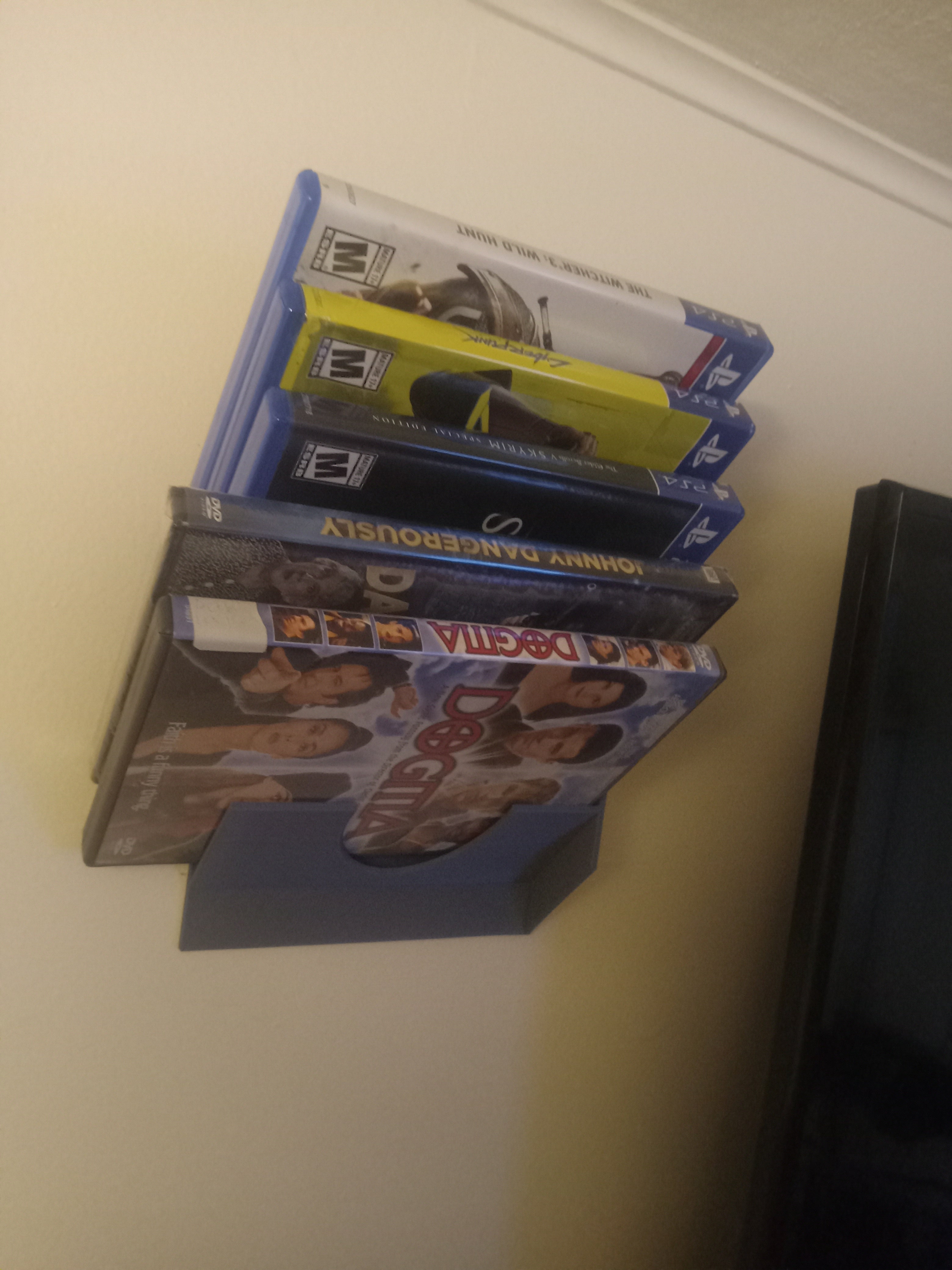 Estante modular de pared para DVD y juegos