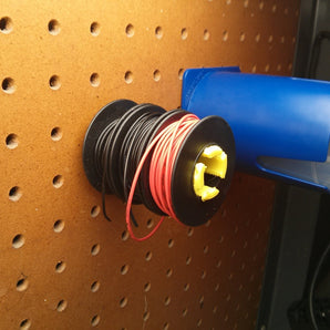 Soporte de panel perforado para rollos de cable: almacenamiento eficiente