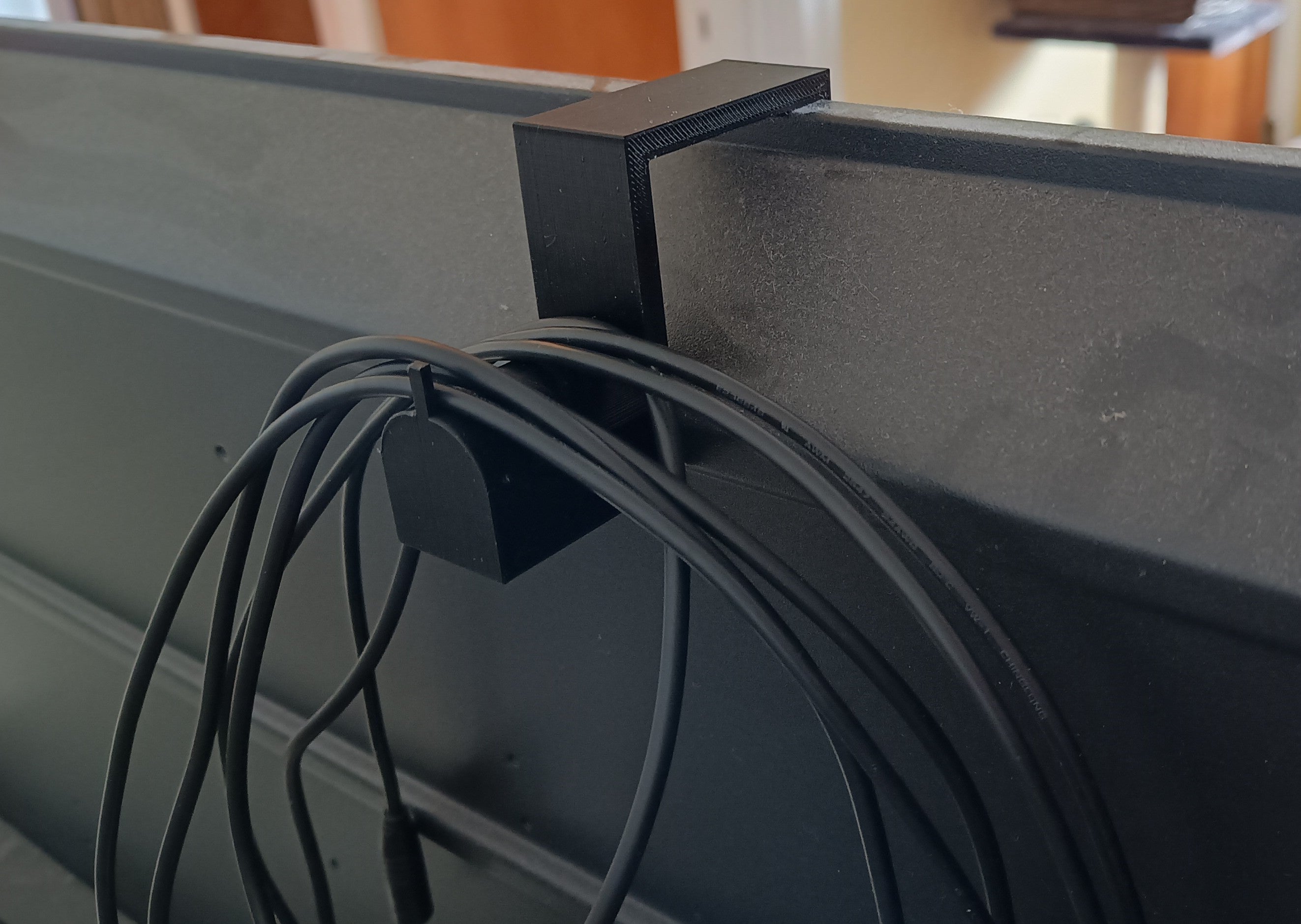 Gancho de cable para TV