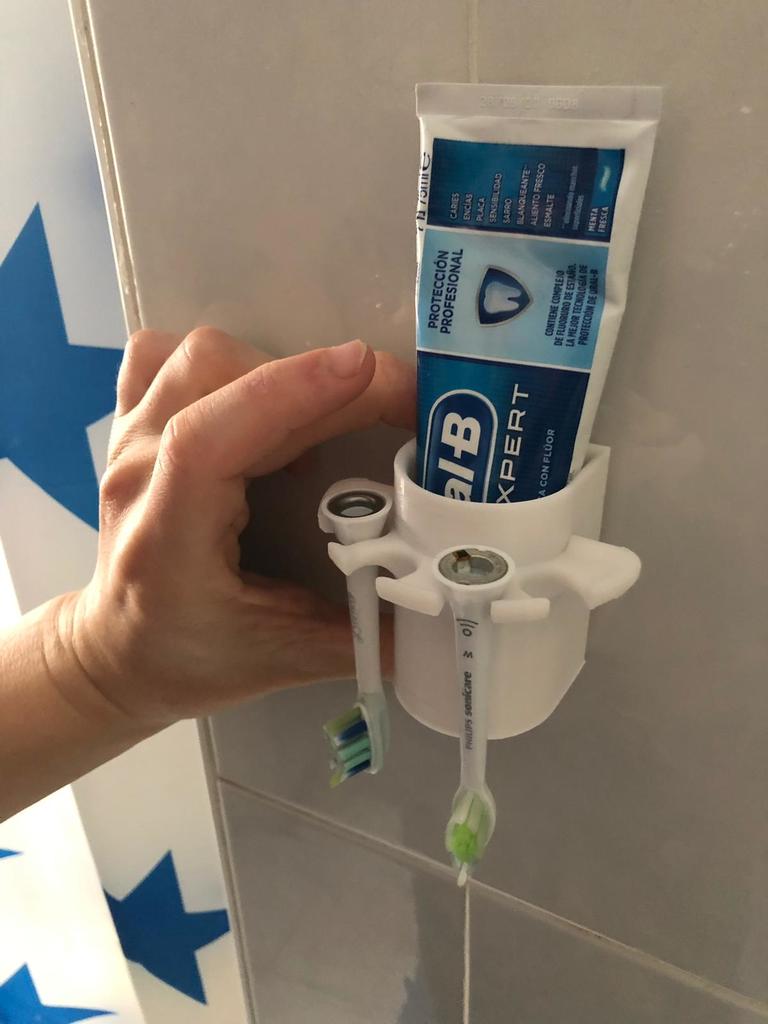 Soporte de pared para pasta de dientes y 4 cabezales de cepillo de dientes Philips Sonicare
