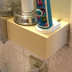 Caja de carga montada en la pared Sonicare para cepillos de dientes