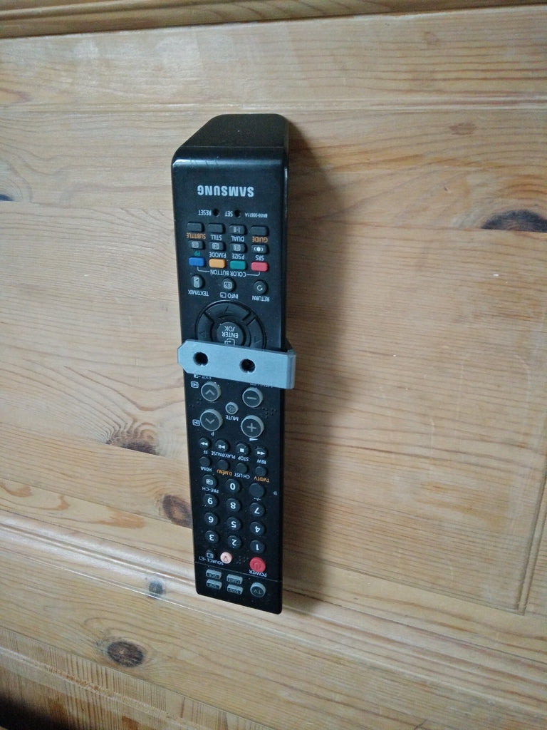 Soporte de pared para mando a distancia Samsung