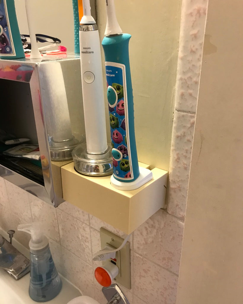 Caja de carga montada en la pared Sonicare para cepillos de dientes