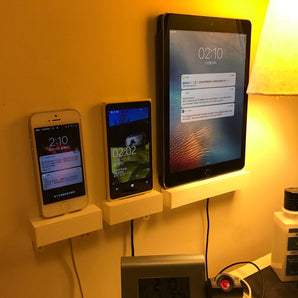 Soporte de pared para tabletas y teléfonos