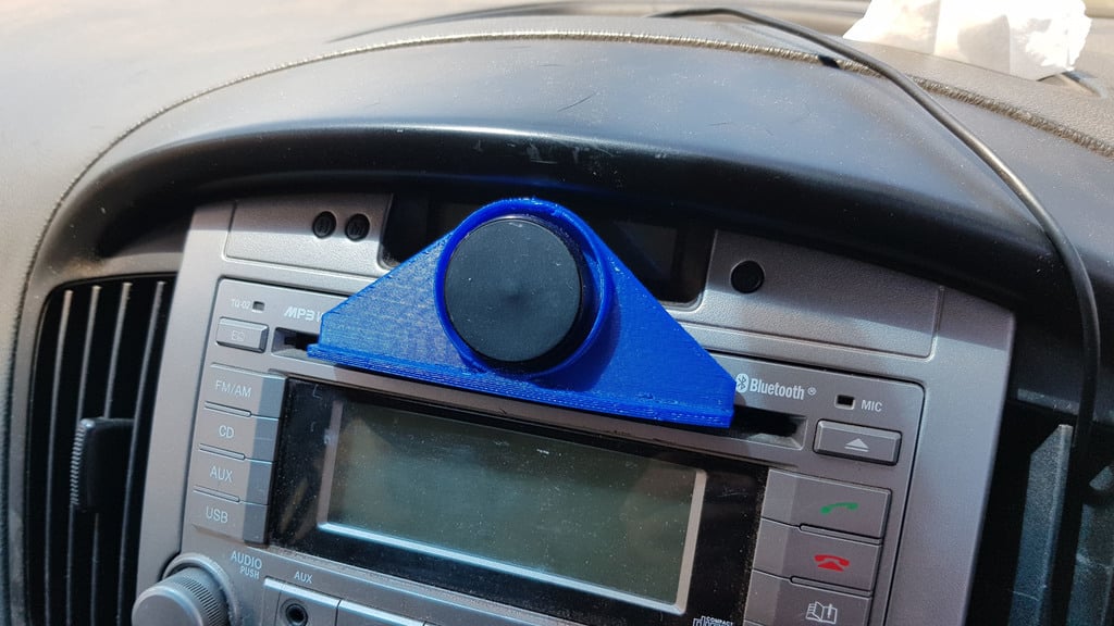 Soporte magnético para tableta y teléfono para el reproductor de CD del coche