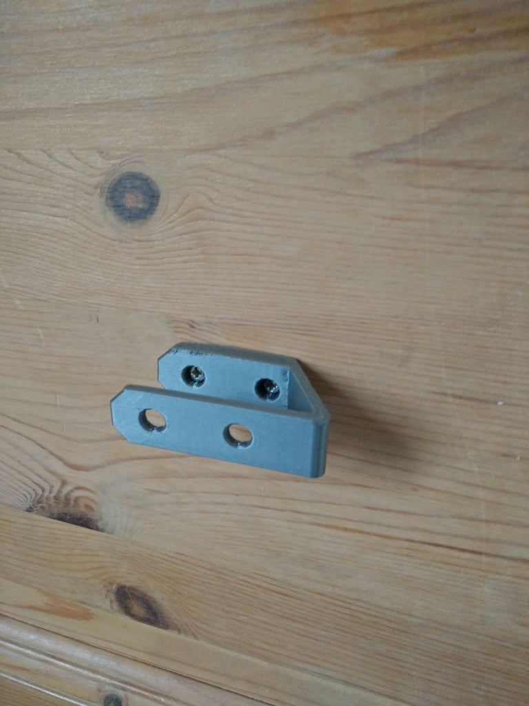 Soporte de pared para mando a distancia Samsung