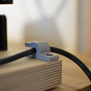 Soporte para cable de alimentación