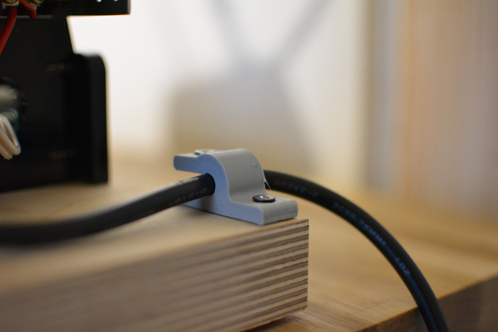 Soporte para montaje de cable de alimentación