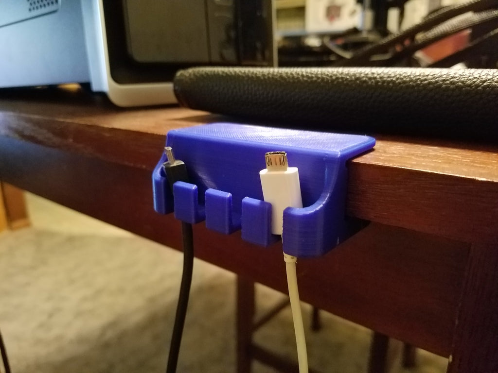 Práctico soporte para cable micro USB para escritorio