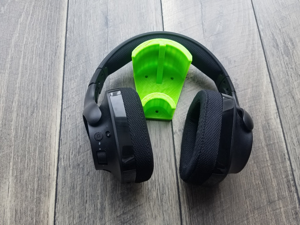 Soporte para auriculares con almacenamiento de cables