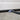 Pase de puerta de garaje para cable de carga de vehículos eléctricos