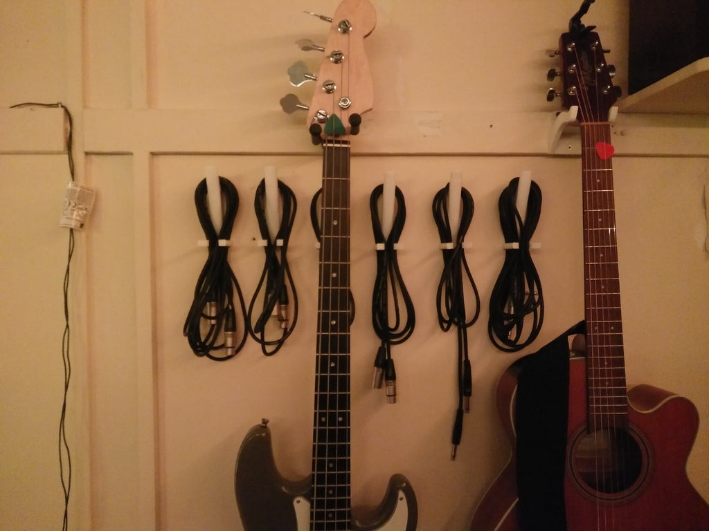 Ganchos para cables de música - Organización de cables de música