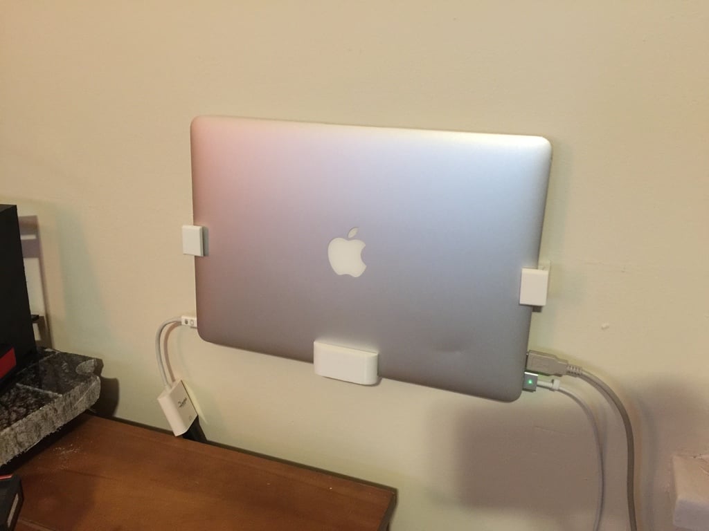 Soportes laterales para montaje en pared de MacBook Air