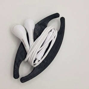 Soporte sencillo para auriculares y enrollador de cables