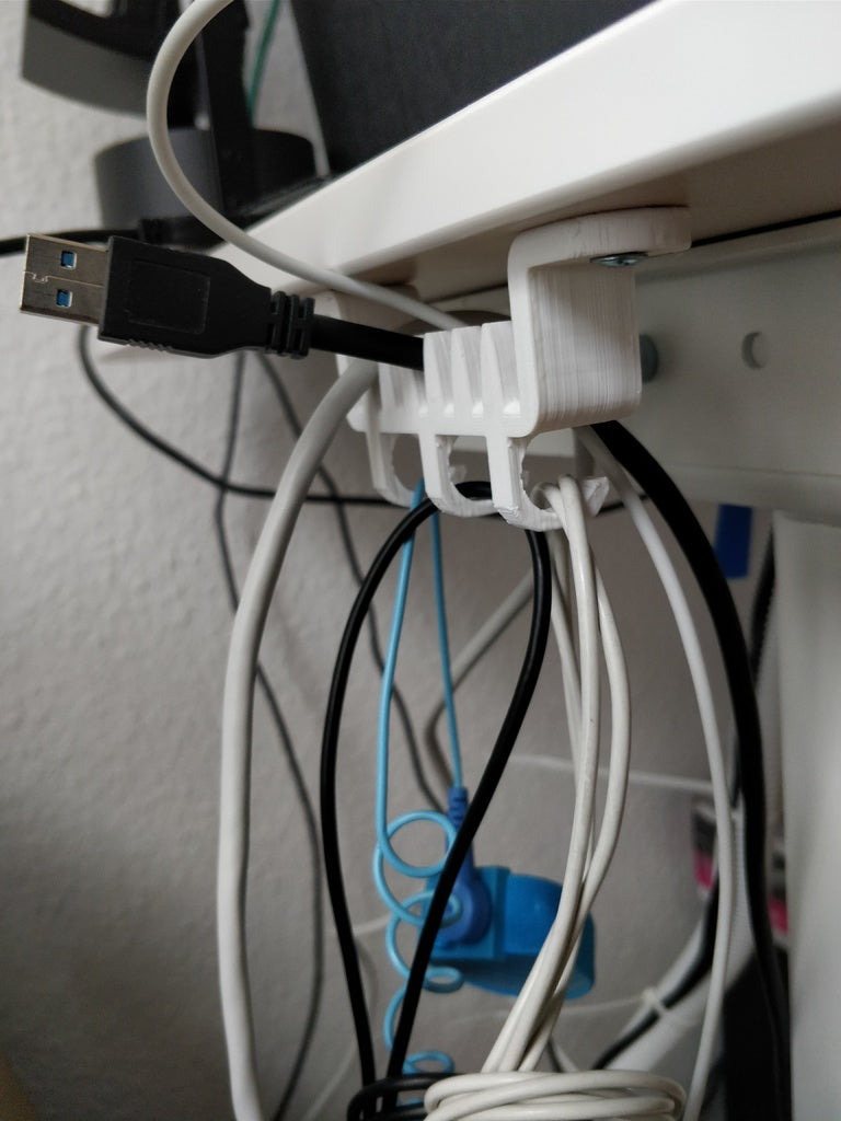 Soporte de cable para debajo de la mesa