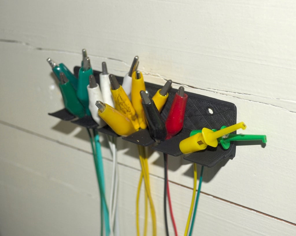 Ganchos de cinta de medición montados en la pared