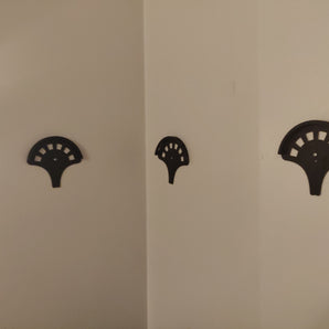 Soporte de pared para gorras