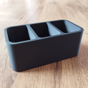 Soporte compacto y elegante para mandos a distancia