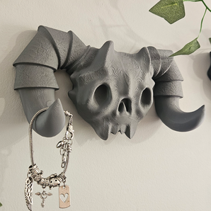 Gancho de pared con cráneo de demonio