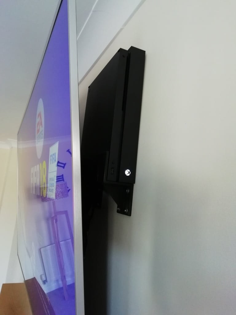 XBox One X - Soporte de pared