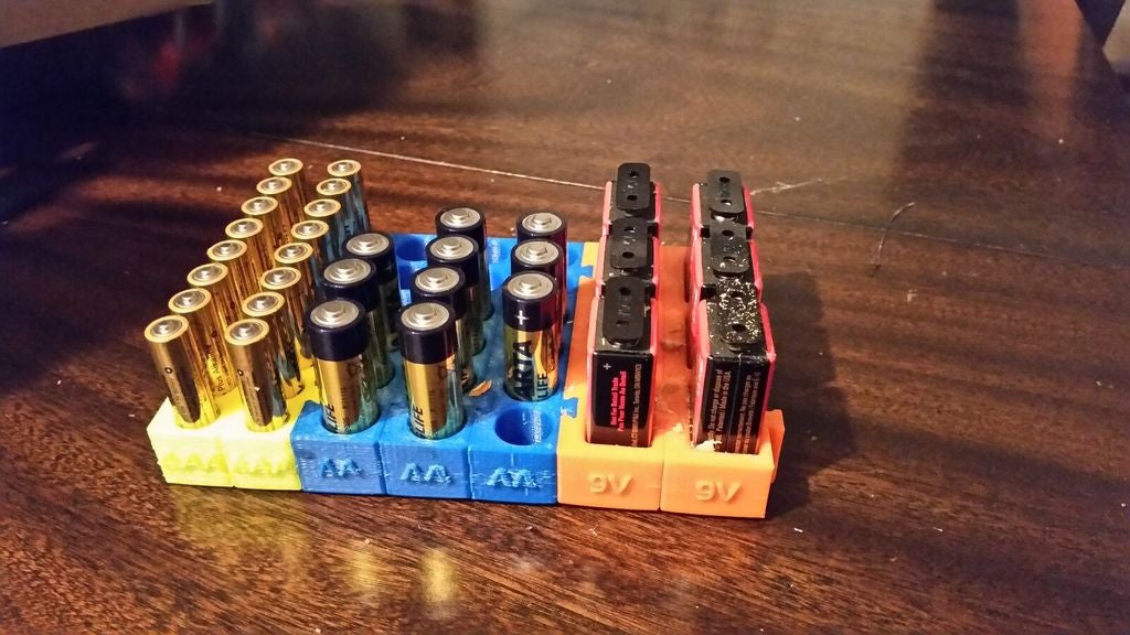Portapilas modular para pilas AA, AAA, de botón y de 9v