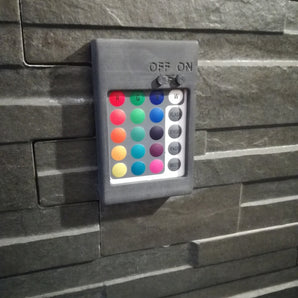 Soporte de pared para mando a distancia LED