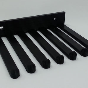 Soporta de pared para cables