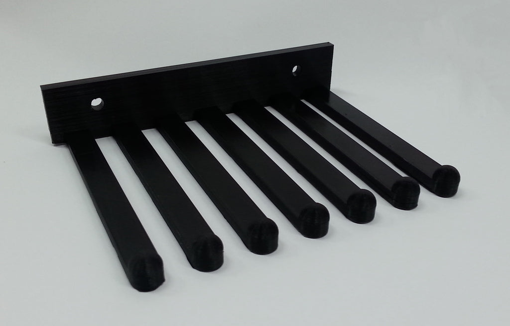 Soporta de pared para cables