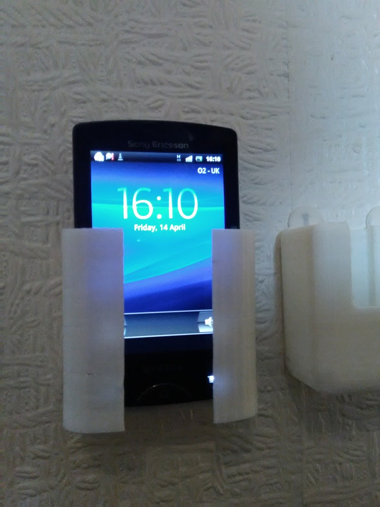 Soporte de mando a distancia para montaje con Command Strips
