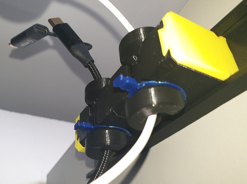 Clip de bloqueo del soporte de cable REVOLving