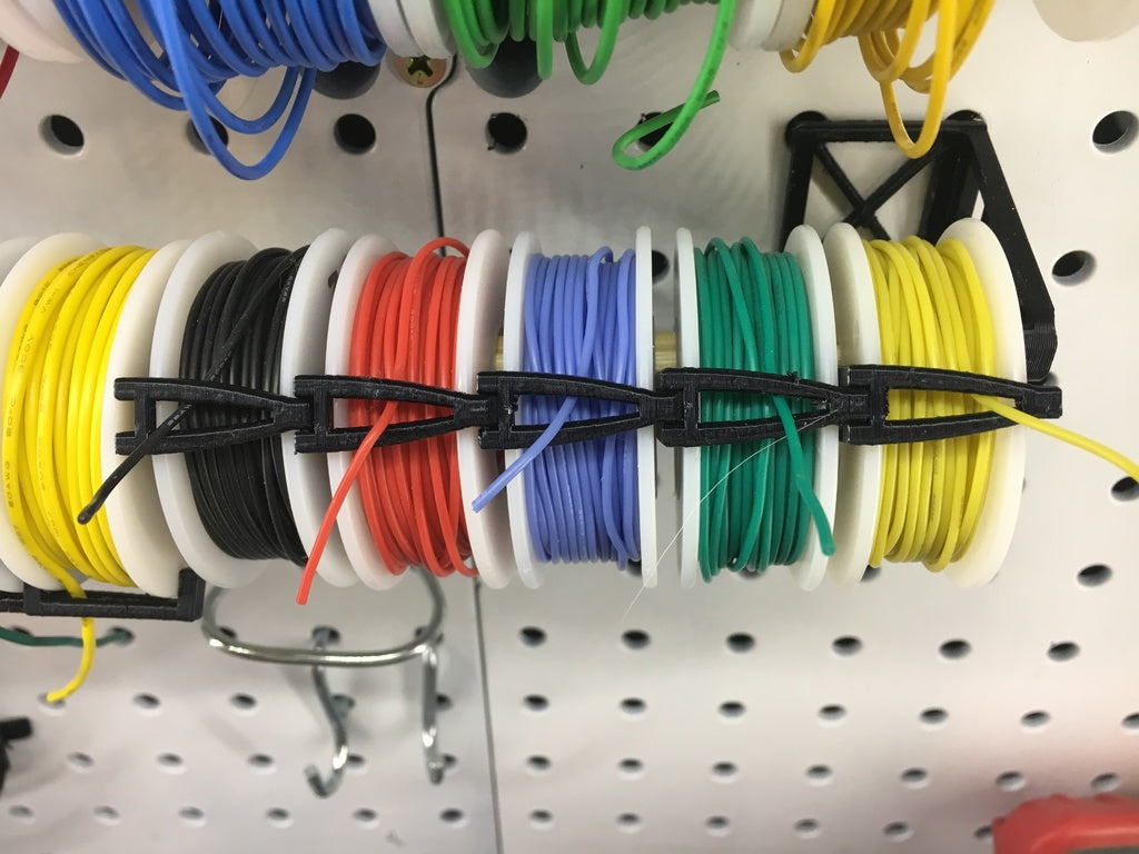 Soporte para cables de tablero perforado para bobinas