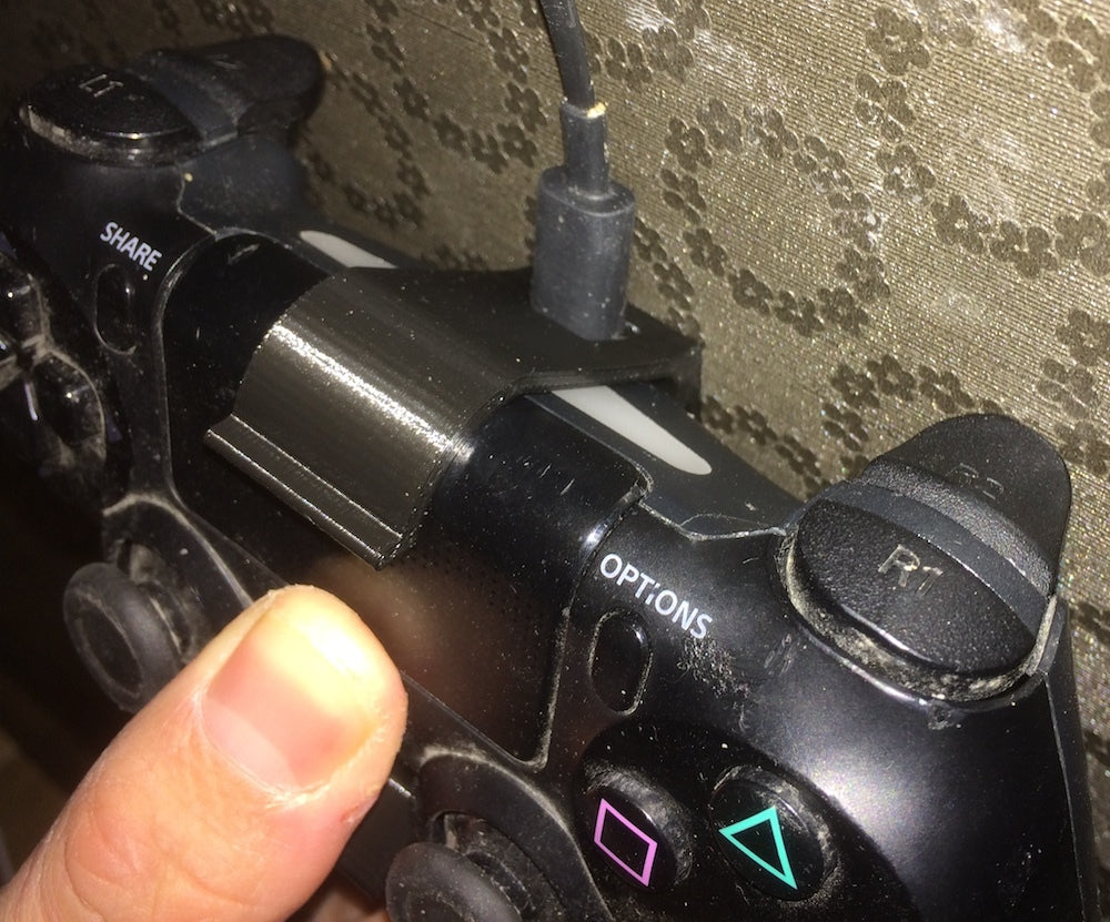Soporte de pared para controlador PS4 con puerto de carga