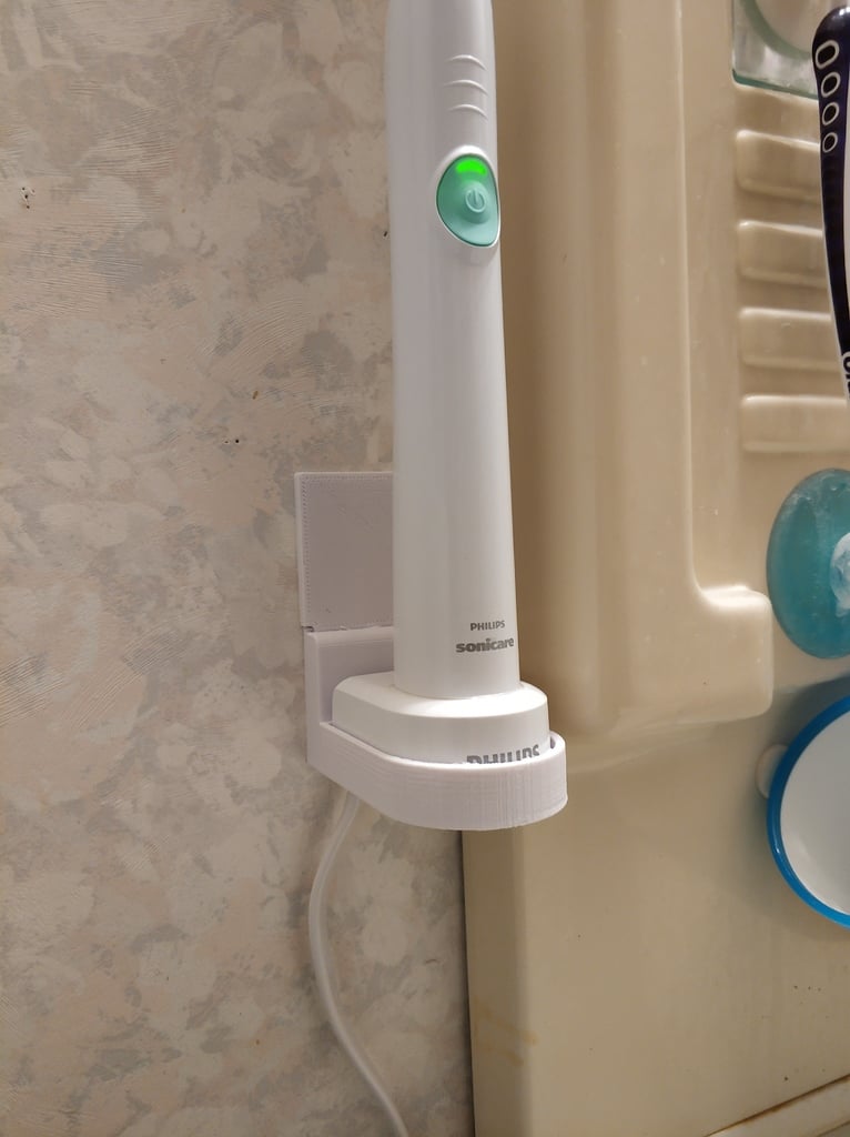 Montaje de pared con folleto para cargador Philips Sonicare