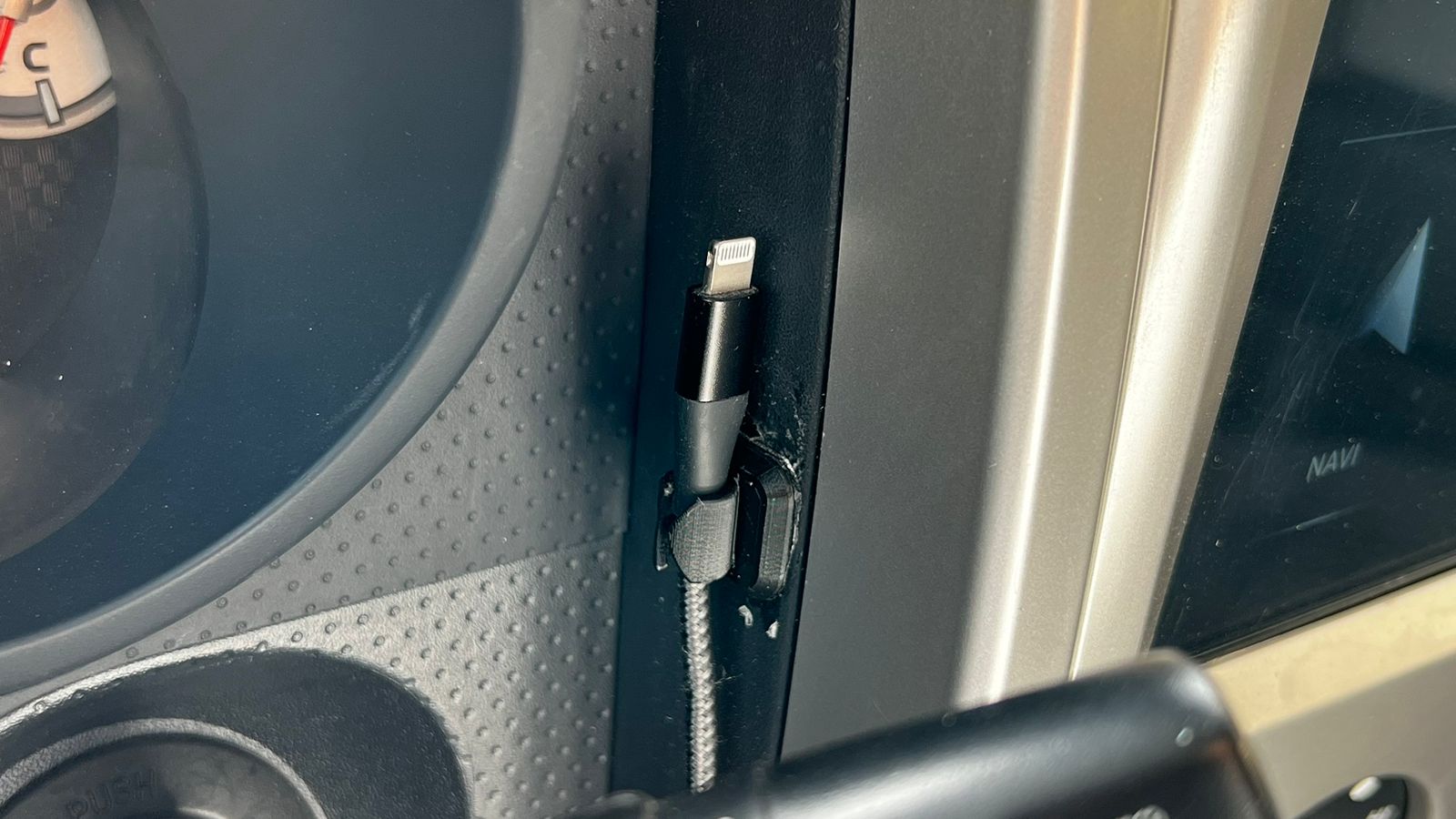 Soporte para cable de carga