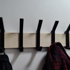 Percheros de pared elegantes y prácticos