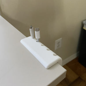 Soporte de cable de escritorio para una gestión eficaz de cables