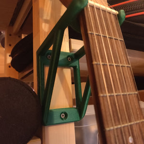 Soporte de guitarra montado en la pared para guitarras pequeñas y para niños