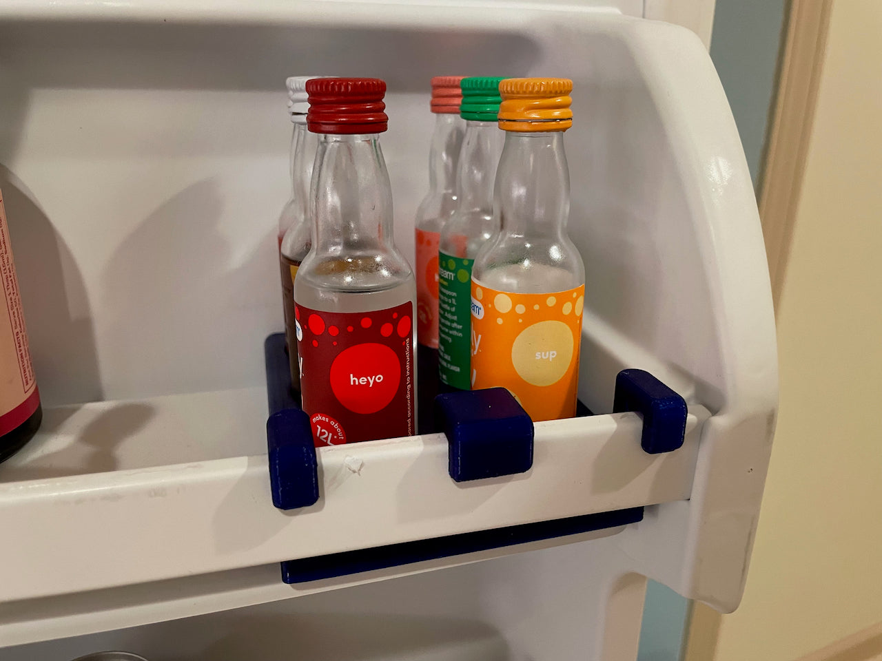 Soporte para botella de sabor Sodastream para el frigorífico