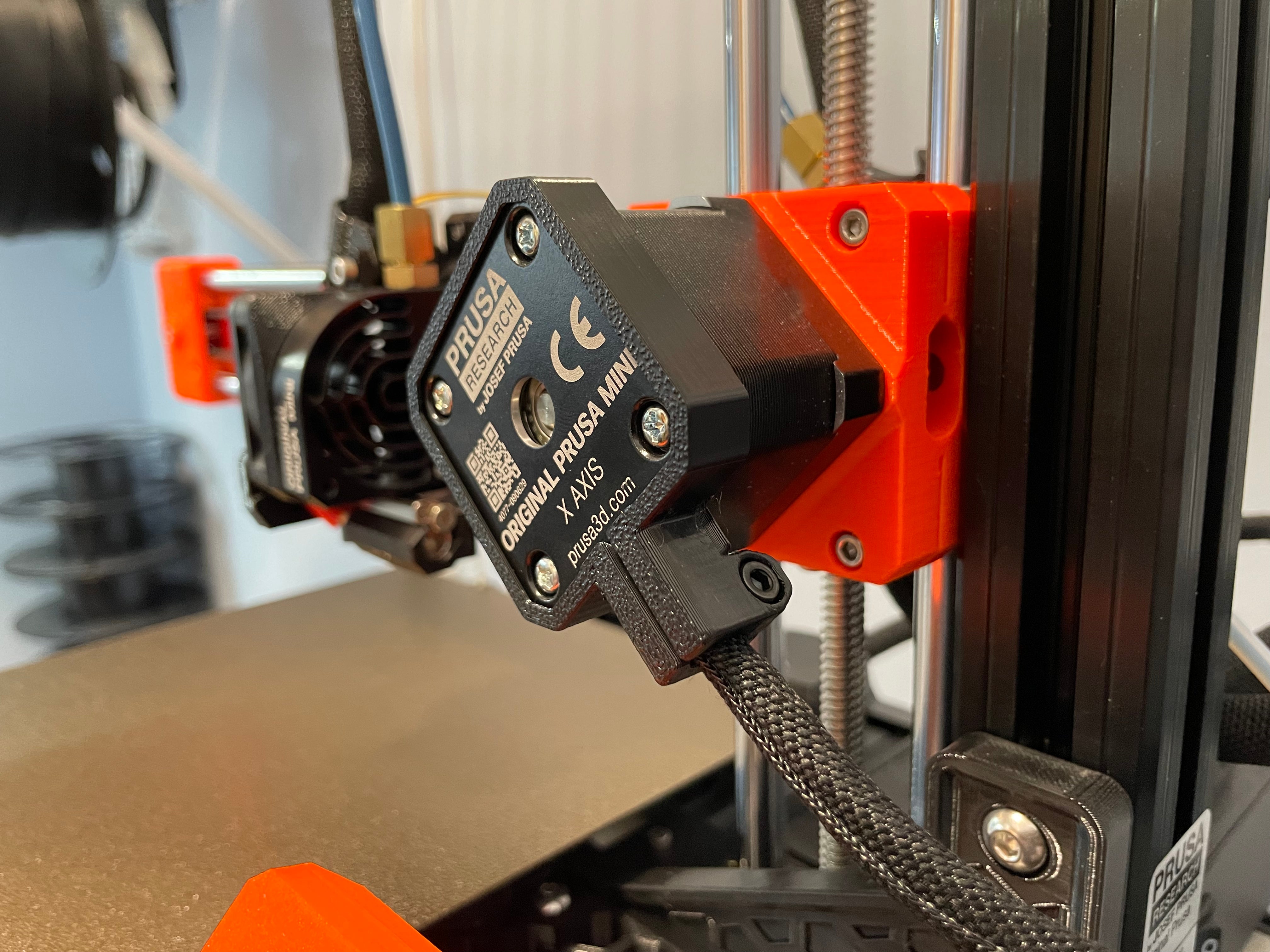 Soporte para cable de motor del eje X Prusa MK3/Mini con alivio de tensión