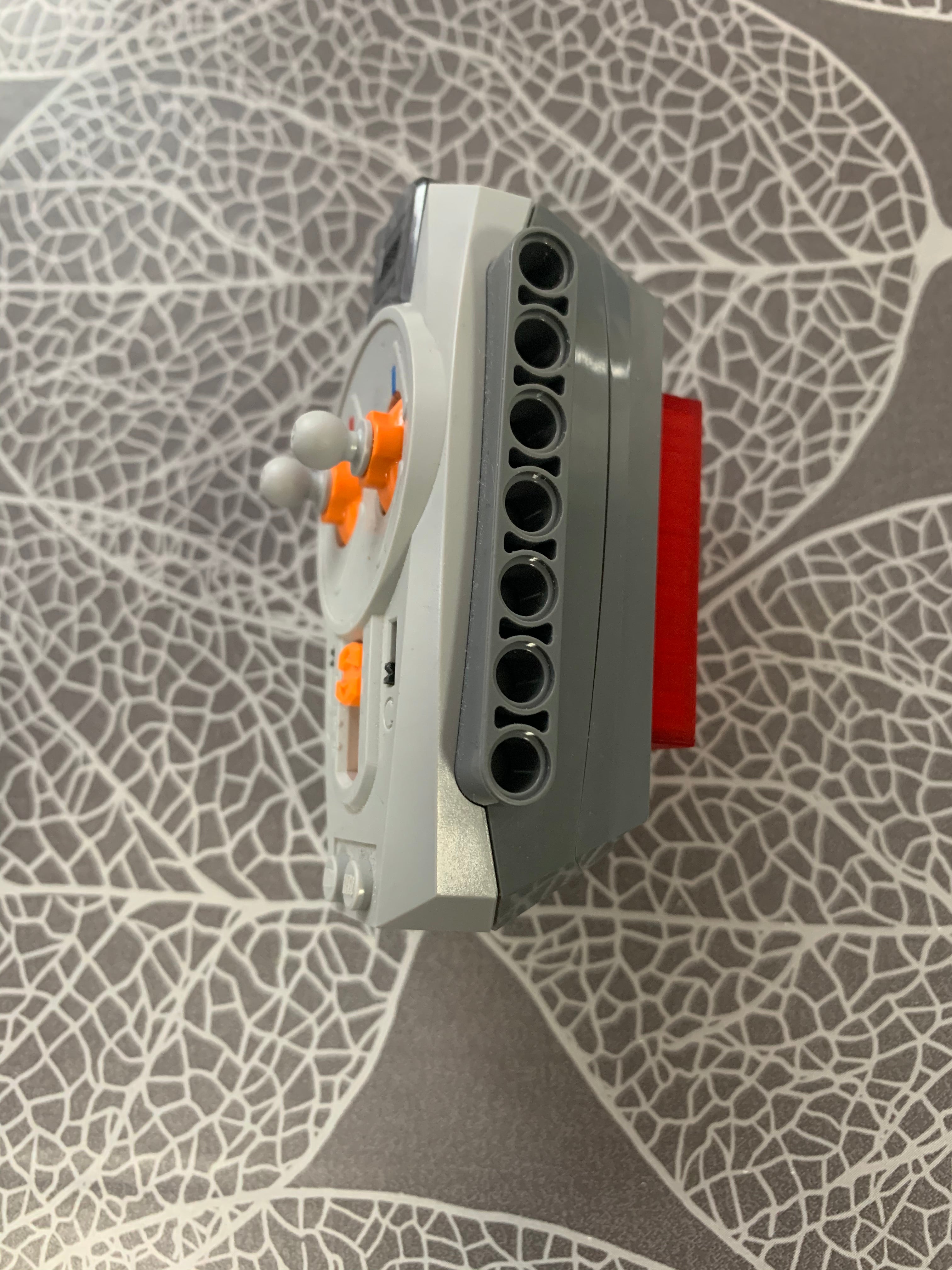 Soporte de pared para mando a distancia por infrarrojos Lego