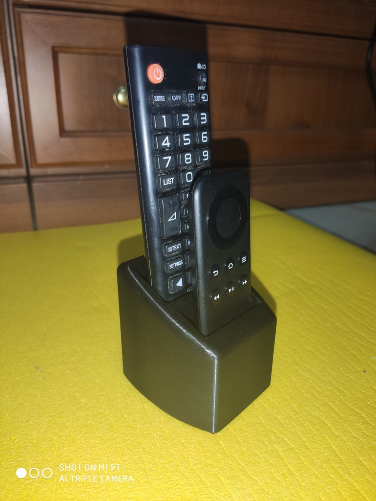 Soporte para mando a distancia con 2 orificios